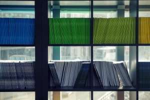Bookshelves picture showing ordered folders.